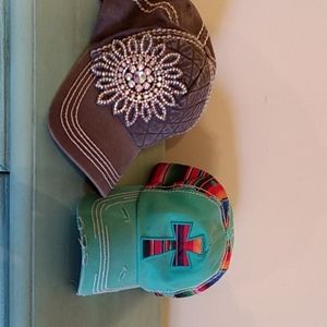 Two women's ball caps